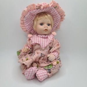 Realistic Looking Blonde Hair Blue Eyed Sitting Baby Doll